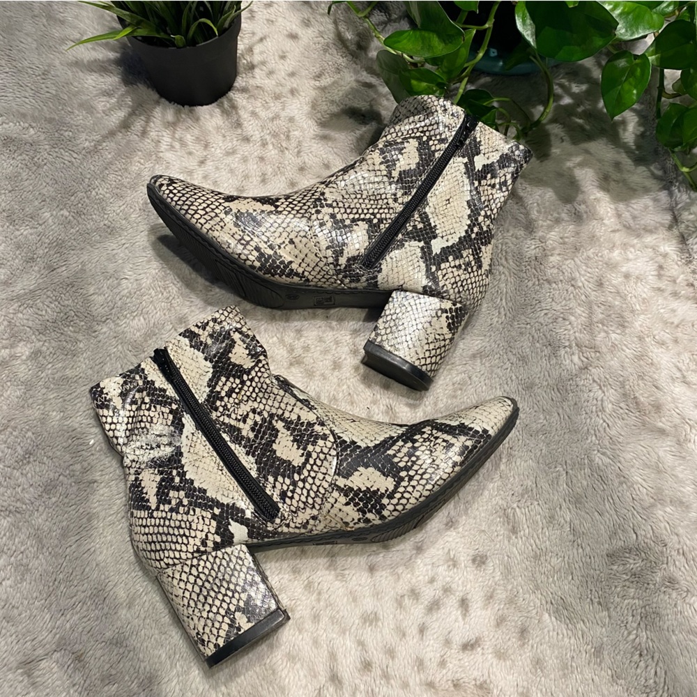 Snakeskin heeled booties